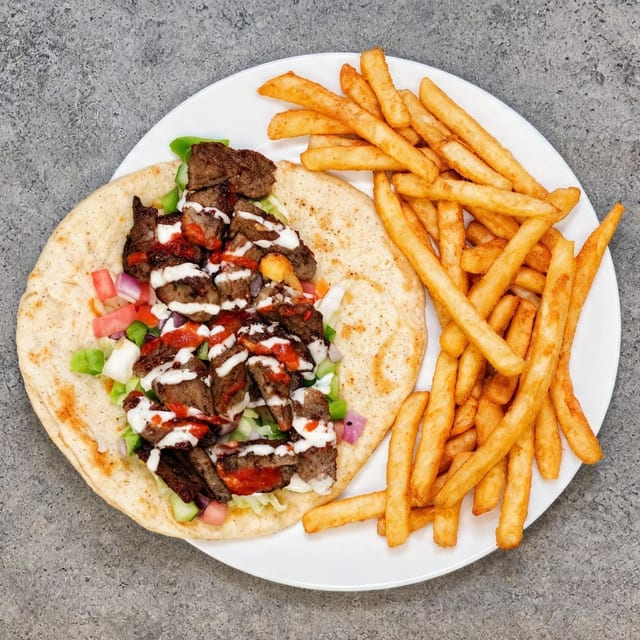 Lamb Gyro with Fries and Can Soda.